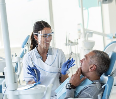 Dentist explaining treatment to patient