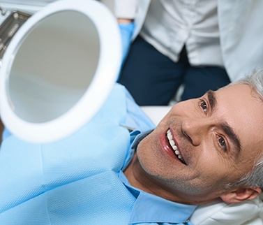 Man smiling in the dental chair